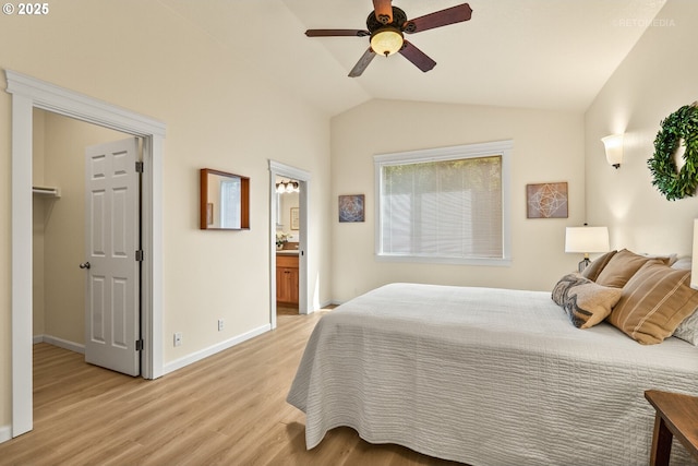 31070 NW Kaybern St, North Plains, OR 97133 - bedroom featuring light wood-style flooring, vaulted ceiling, a ceiling fan, and ensuite bathroom