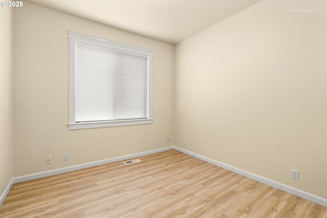 31070 NW Kaybern St, North Plains, OR 97133 - spare room featuring wood finished floors and baseboards