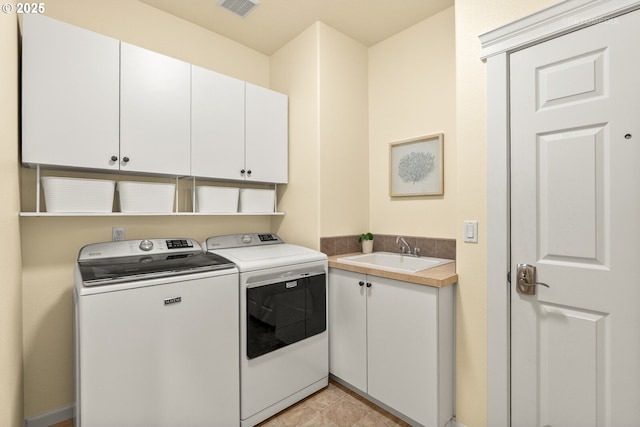 31070 NW Kaybern St, North Plains, OR 97133 - laundry room featuring cabinet space and washing machine and dryer