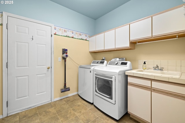 1670 NE Jackson School Rd, Hillsboro, OR 97124 - laundry room featuring independent washer and dryer, cabinet space, and baseboards