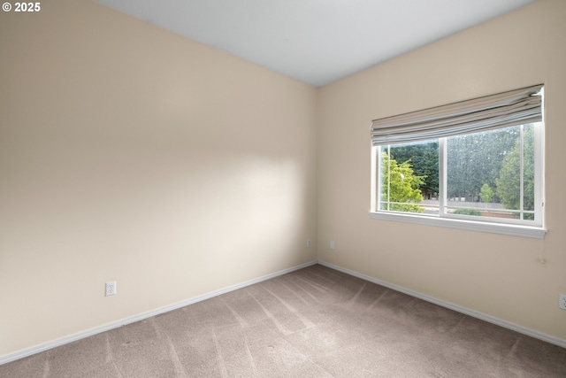 1670 NE Jackson School Rd, Hillsboro, OR 97124 - empty room featuring light colored carpet and baseboards