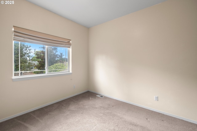 1670 NE Jackson School Rd, Hillsboro, OR 97124 - spare room featuring light carpet and baseboards