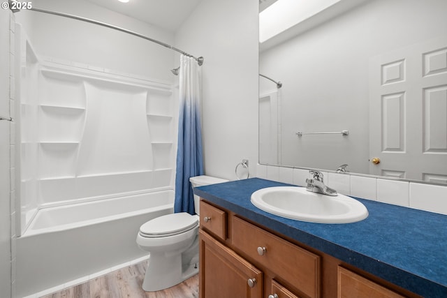1670 NE Jackson School Rd, Hillsboro, OR 97124 - full bath featuring shower / bathtub combination with curtain, wood finished floors, vanity, and toilet