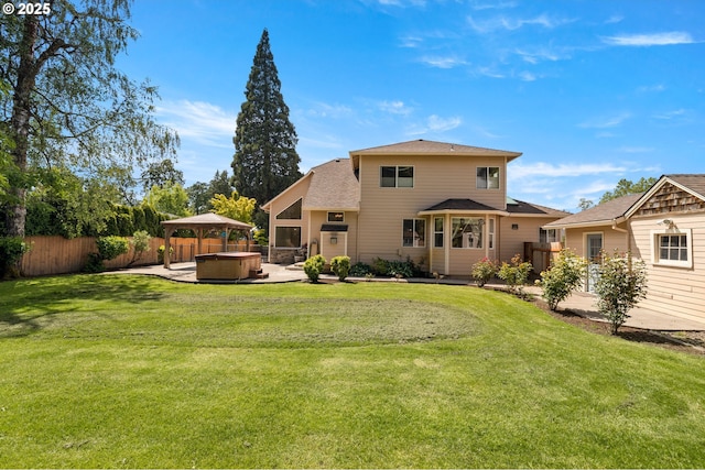 1670 NE Jackson School Rd, Hillsboro, OR 97124 - back of house with a hot tub, a gazebo, a patio, and a shingled roof