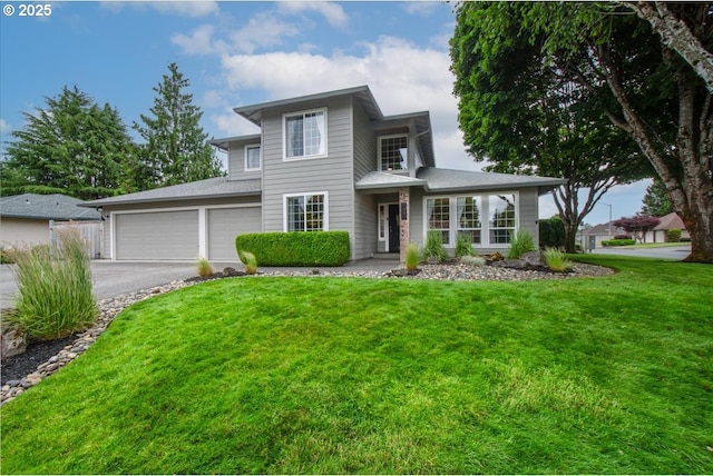 817 NW 141st St, Vancouver, WA 98685 - view of front of property with asphalt driveway, a front yard, roof with shingles, and an attached garage