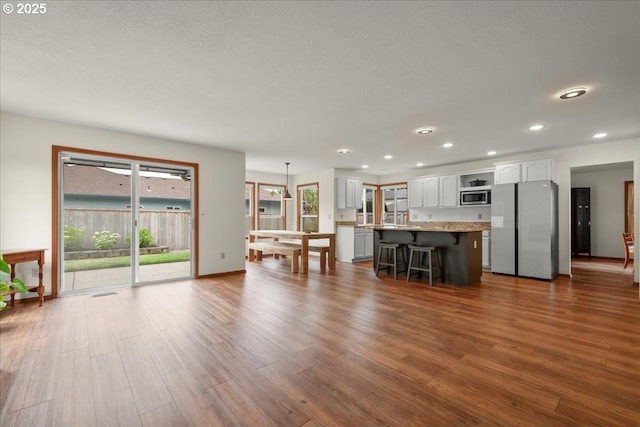 817 NW 141st St, Vancouver, WA 98685 - living room with dark wood-style flooring and recessed lighting
