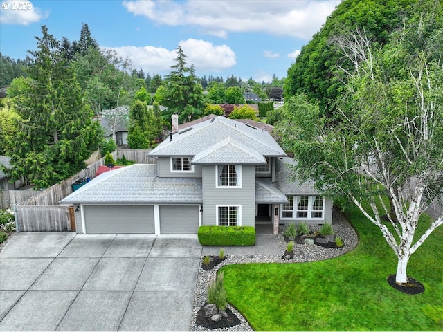 817 NW 141st St, Vancouver, WA 98685 - view of front of property with driveway, a garage, and a shingled roof