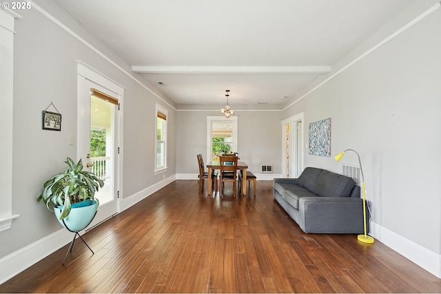 1006 4th Ave, Mosier, OR 97040 - dining area with dark wood-style floors, a chandelier, and baseboards