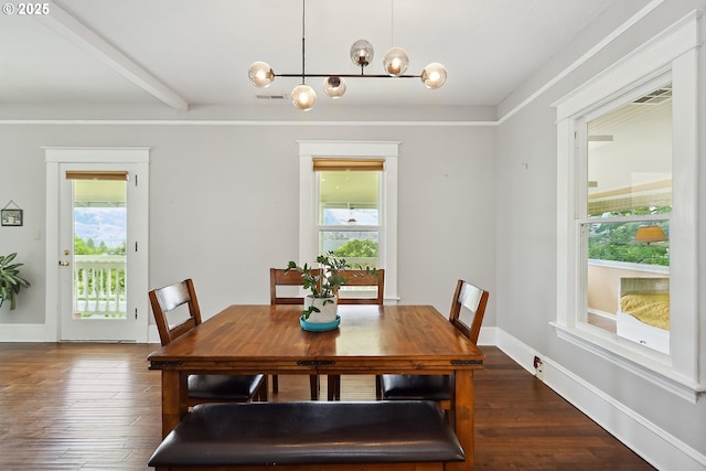 1006 4th Ave, Mosier, OR 97040 - dining area featuring dark wood-type flooring, a chandelier, and baseboards