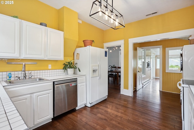 1006 4th Ave, Mosier, OR 97040 - kitchen with dishwasher, a sink, white refrigerator with ice dispenser, and dark wood-type flooring
