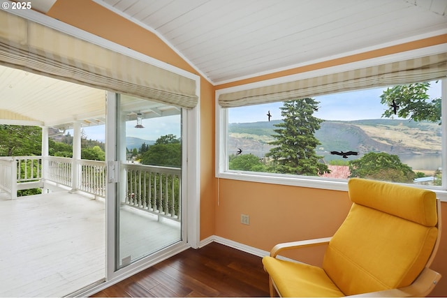 1006 4th Ave, Mosier, OR 97040 - sunroom / solarium featuring lofted ceiling, wood finished floors, and baseboards