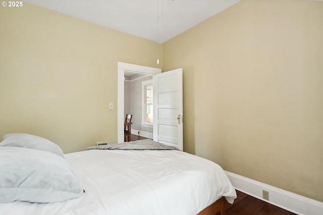 1006 4th Ave, Mosier, OR 97040 - bedroom featuring baseboards and dark wood finished floors