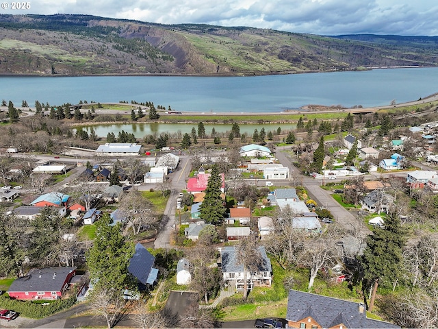 1006 4th Ave, Mosier, OR 97040 - aerial view of property and surrounding area featuring a water and mountain view and nearby suburban area