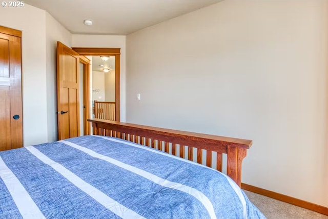 bedroom featuring carpet