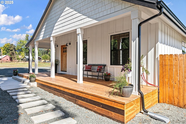 wooden terrace featuring a porch