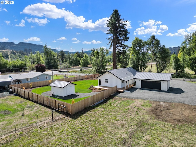 drone / aerial view featuring a mountain view