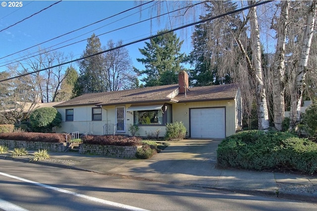 ranch-style house with a garage