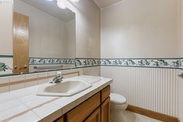 1705 SW 24th Dr, Gresham, OR 97080 - bathroom featuring vanity, toilet, and wallpapered walls