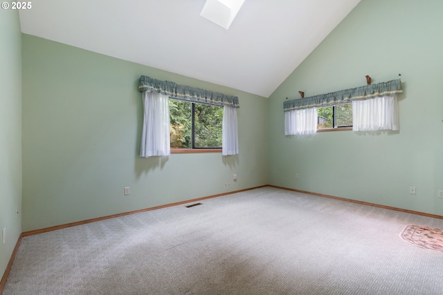 1705 SW 24th Dr, Gresham, OR 97080 - spare room with a skylight, carpet flooring, baseboards, and lofted ceiling
