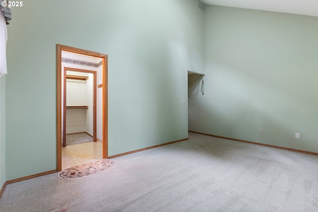 1705 SW 24th Dr, Gresham, OR 97080 - carpeted empty room with baseboards and a towering ceiling