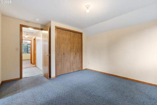 1705 SW 24th Dr, Gresham, OR 97080 - unfurnished bedroom featuring carpet floors, baseboards, a closet, and vaulted ceiling