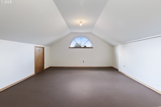 1705 SW 24th Dr, Gresham, OR 97080 - additional living space with vaulted ceiling, concrete flooring, and baseboards
