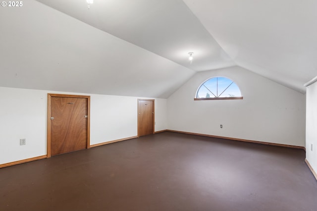 1705 SW 24th Dr, Gresham, OR 97080 - bonus room featuring vaulted ceiling, concrete flooring, and baseboards