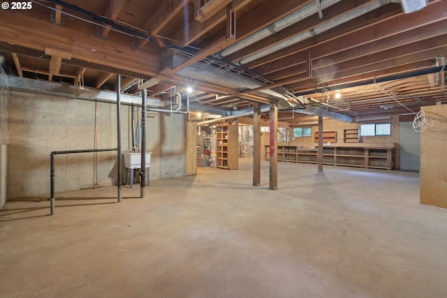 1705 SW 24th Dr, Gresham, OR 97080 - basement with a sink and water heater