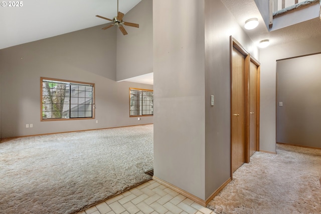 1705 SW 24th Dr, Gresham, OR 97080 - corridor with light colored carpet, high vaulted ceiling, and baseboards