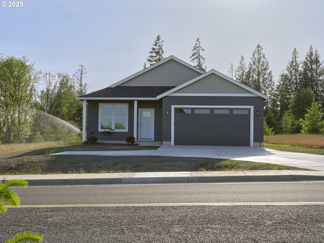 521 Kakela Rd, Winlock, WA 98596 - view of front of property featuring a garage and driveway