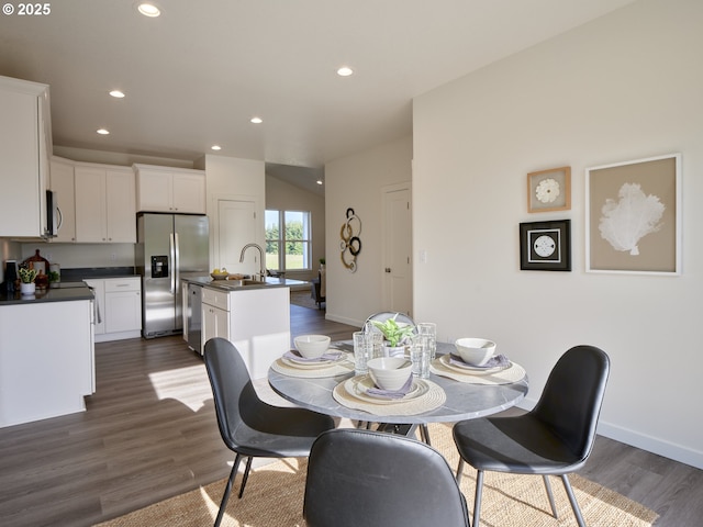 521 Kakela Rd, Winlock, WA 98596 - dining room with dark wood-type flooring, recessed lighting, and baseboards