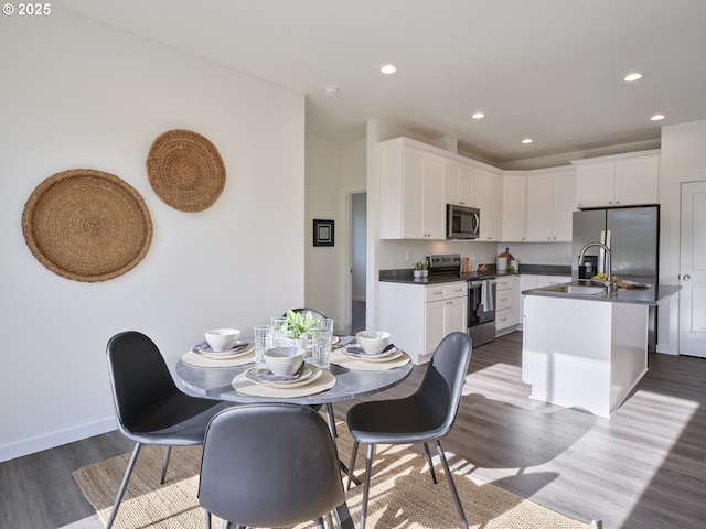 521 Kakela Rd, Winlock, WA 98596 - dining space with dark wood-style floors, recessed lighting, and baseboards