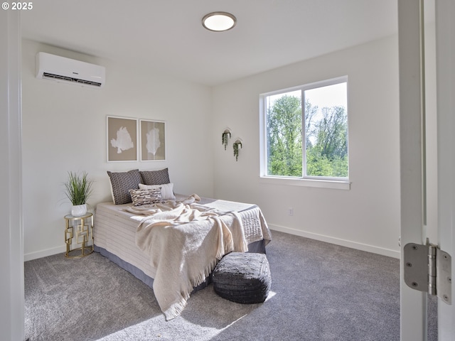 521 Kakela Rd, Winlock, WA 98596 - carpeted bedroom featuring an AC wall unit and baseboards