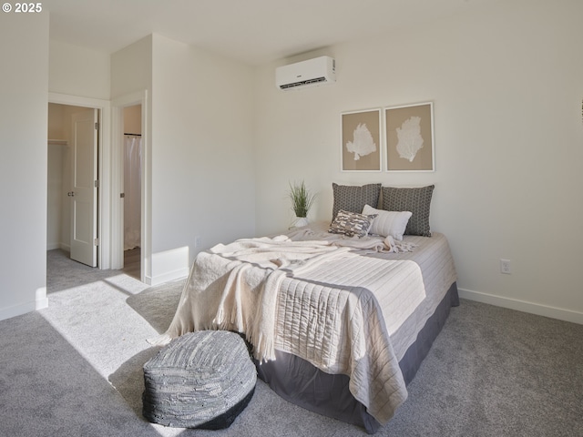 521 Kakela Rd, Winlock, WA 98596 - carpeted bedroom featuring a wall mounted air conditioner and baseboards