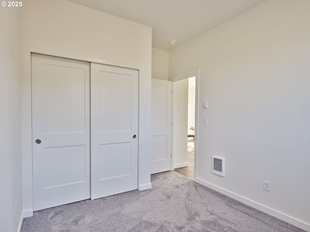 521 Kakela Rd, Winlock, WA 98596 - unfurnished bedroom featuring carpet flooring, a closet, and baseboards