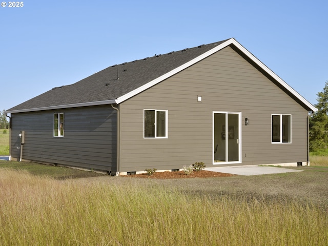521 Kakela Rd, Winlock, WA 98596 - back of property featuring a patio area and roof with shingles