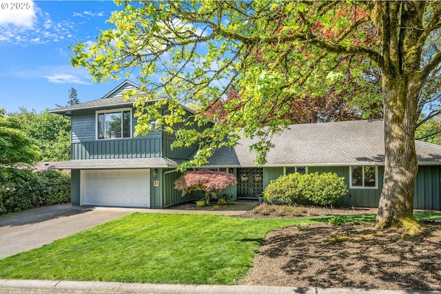 51 Touchstone, Lake Oswego, OR 97035 - view of front facade featuring a garage, board and batten siding, driveway, and a shingled roof