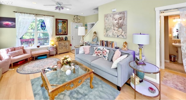 living area with ceiling fan, wood finished floors, recessed lighting, and baseboards