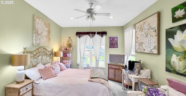 carpeted bedroom featuring recessed lighting and a ceiling fan