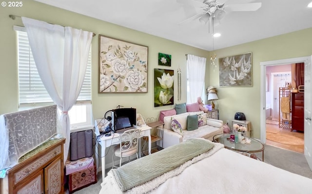 bedroom featuring a desk, carpet floors, ensuite bathroom, ceiling fan, and recessed lighting