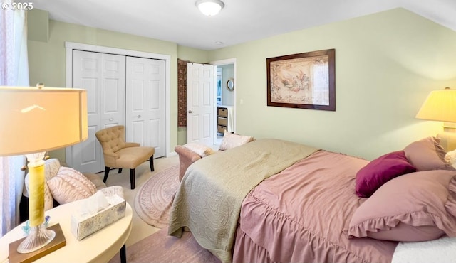 carpeted bedroom with a closet