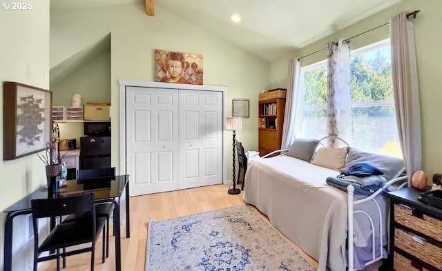 living room with wood finished floors and recessed lighting