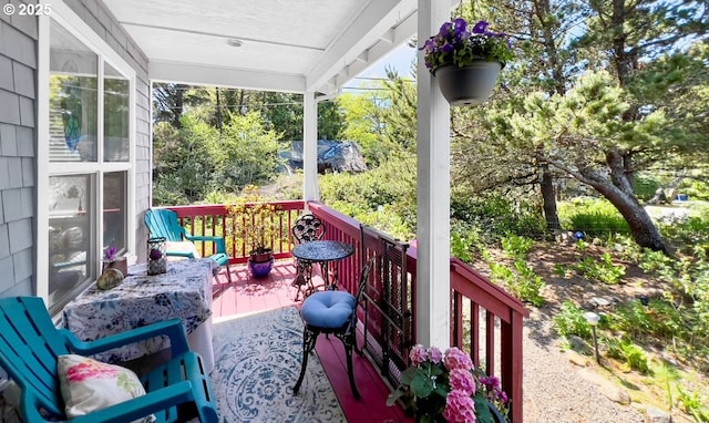 balcony featuring covered porch