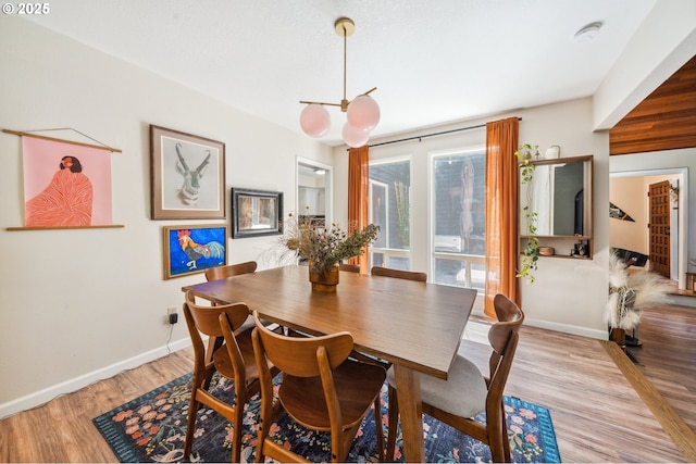 16523 NE Fargo Cir, Portland, OR 97230 - dining space featuring baseboards and light wood finished floors
