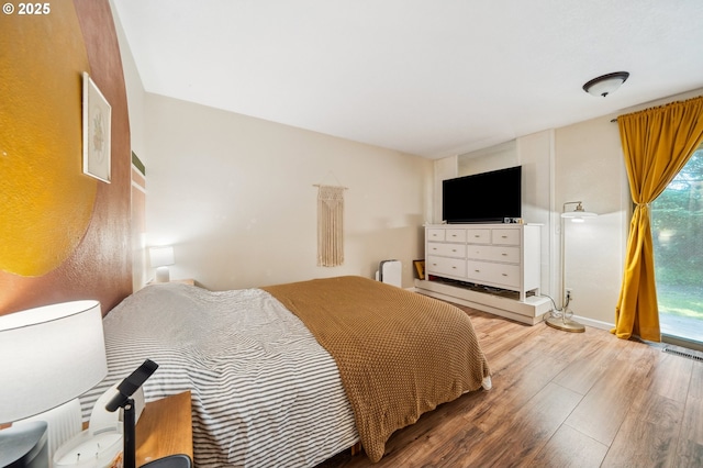16523 NE Fargo Cir, Portland, OR 97230 - bedroom featuring wood finished floors