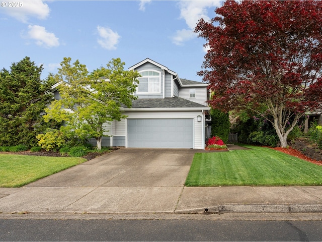 view of front of house featuring a garage, driveway, a front yard, and roof with shingles