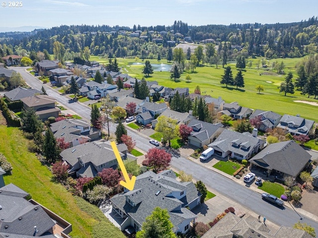 aerial perspective of suburban area with a golf club