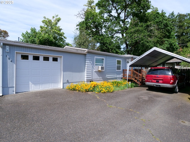 154 N 5th St, Saint Helens, OR 97051 - view of front facade featuring a carport and driveway