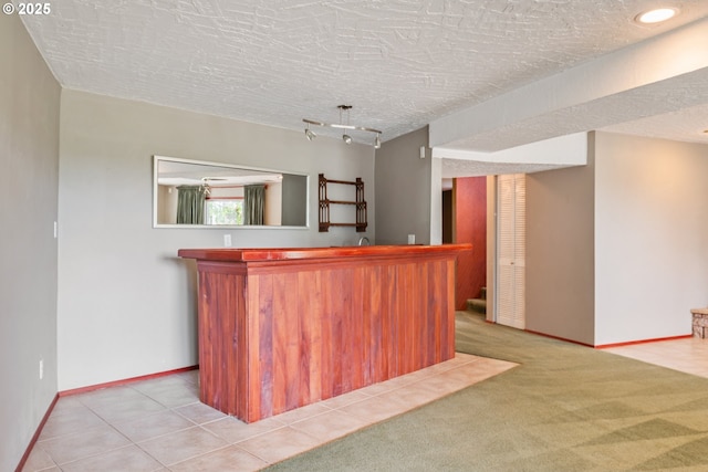 112 Paine Rd, Castle Rock, WA 98611 - indoor wet bar featuring a textured ceiling and baseboards