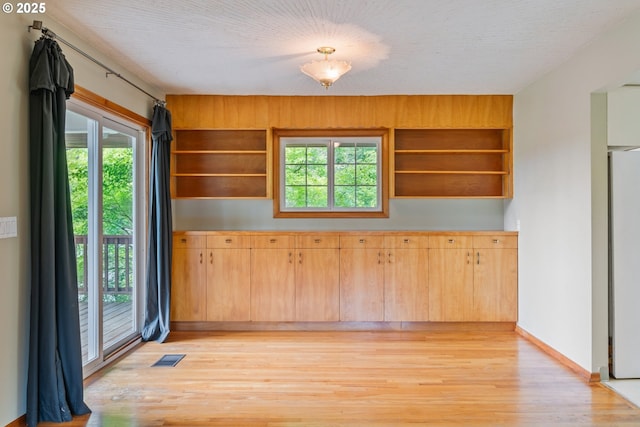 112 Paine Rd, Castle Rock, WA 98611 - unfurnished dining area featuring light wood-style flooring